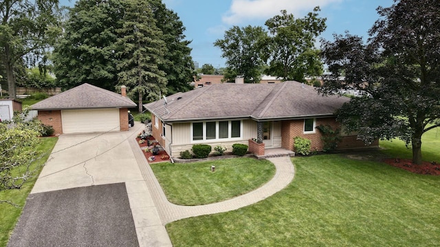 ranch-style house with a garage, a chimney, brick siding, and a front yard