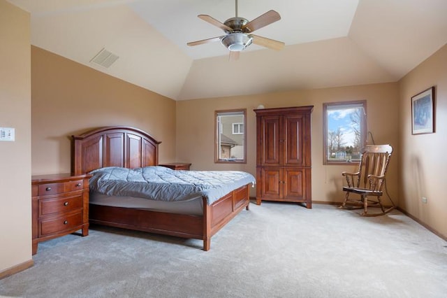 carpeted bedroom featuring lofted ceiling and ceiling fan