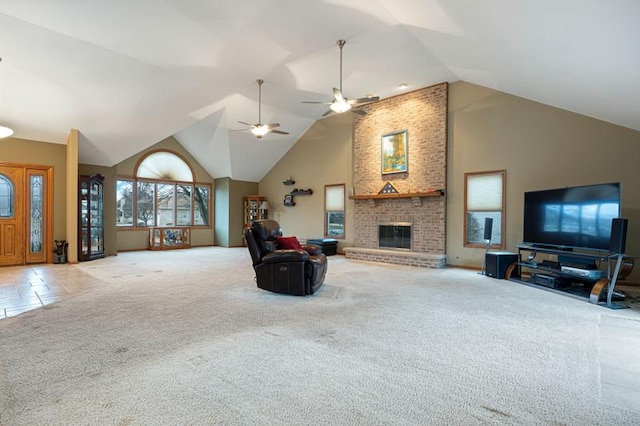 carpeted living room featuring a brick fireplace and high vaulted ceiling