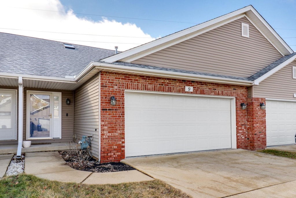 exterior space featuring a garage