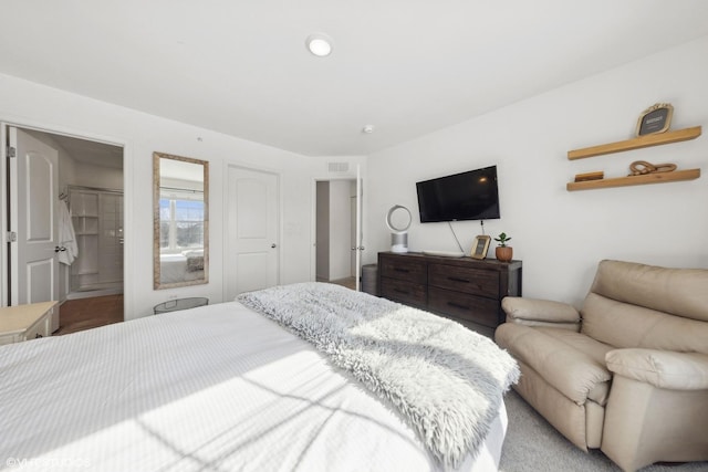 bedroom featuring visible vents