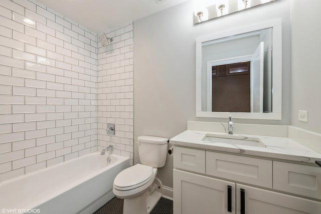 bathroom with tub / shower combination, toilet, and vanity