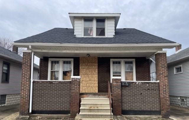 bungalow-style house featuring a porch