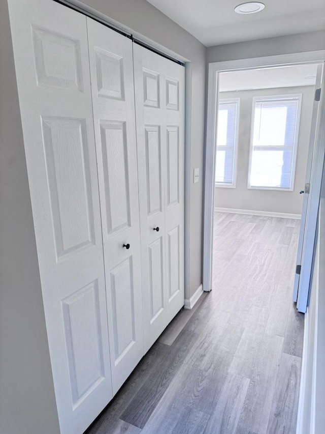 hallway featuring light wood-type flooring