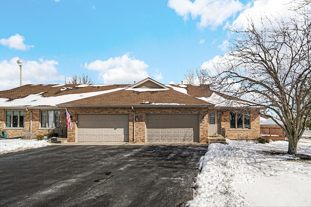 single story home featuring a garage