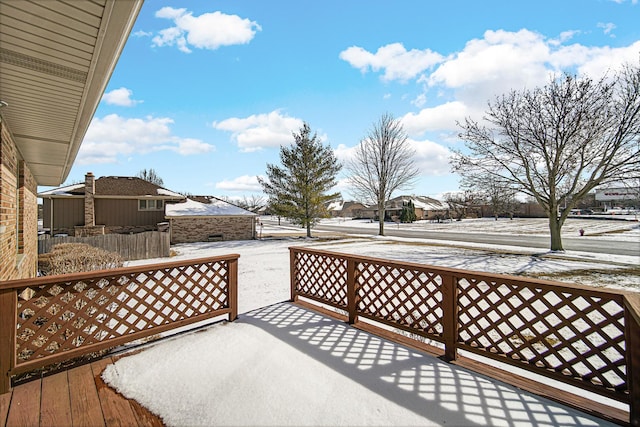 view of snow covered deck