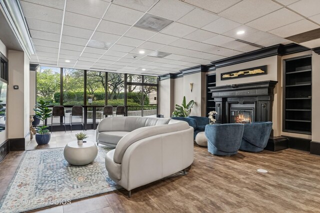 10 E Ontario St Unit 4308, Chicago, IL 60611 - living room with a wall of windows, a glass covered fireplace, and recessed lighting