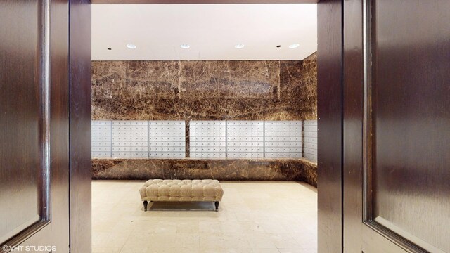 10 E Ontario St Unit 4308, Chicago, IL 60611 - bathroom featuring mail area, recessed lighting, and tile patterned floors
