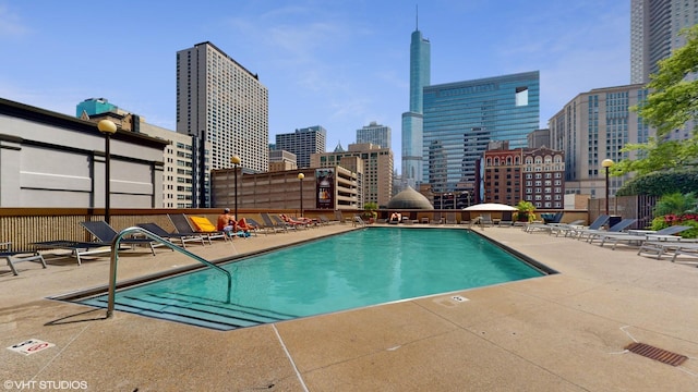 10 E Ontario St Unit 4308, Chicago, IL 60611 - community pool with a patio and a view of skyline