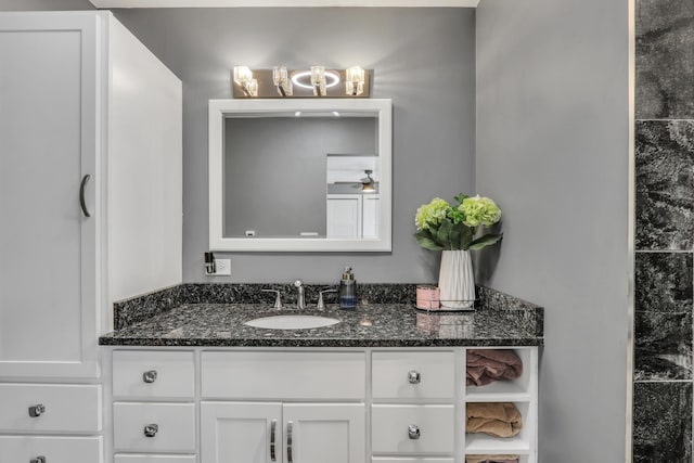 bathroom featuring vanity and ceiling fan