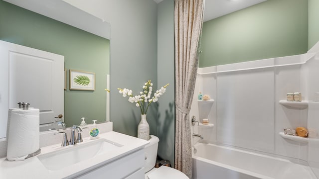 full bathroom featuring vanity, toilet, and shower / bath combo with shower curtain