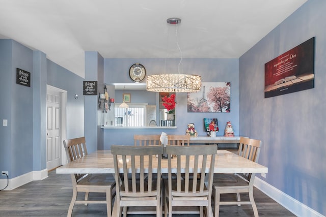 dining room with hardwood / wood-style flooring