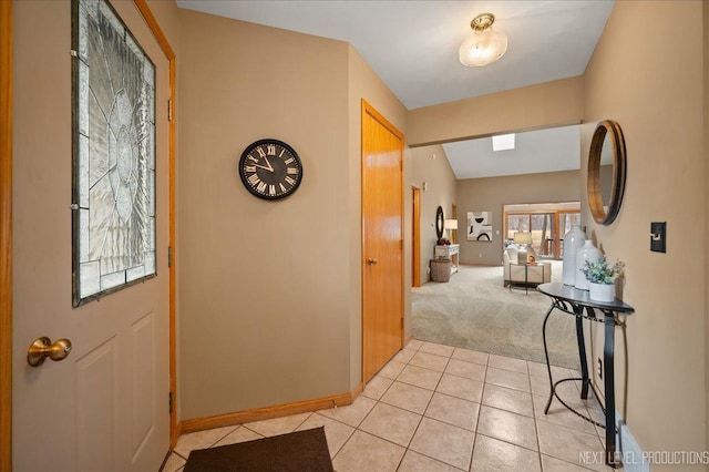 view of carpeted foyer