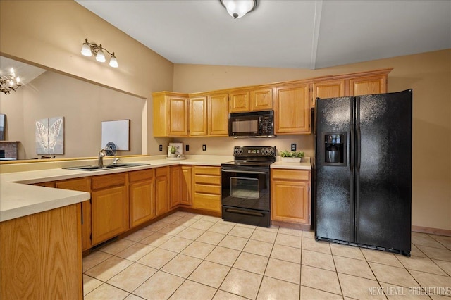 kitchen featuring light tile patterned flooring, sink, a chandelier, vaulted ceiling, and black appliances