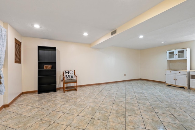 basement with light tile patterned floors