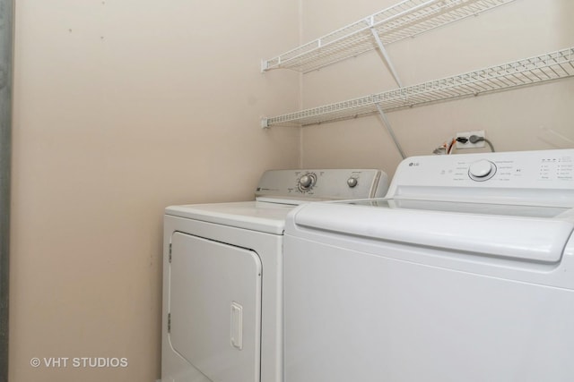 laundry room featuring washer and dryer