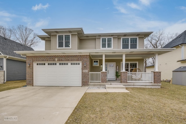 view of front facade with a garage, covered porch, and a front lawn