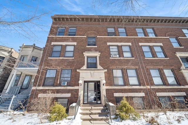 view of front facade featuring brick siding