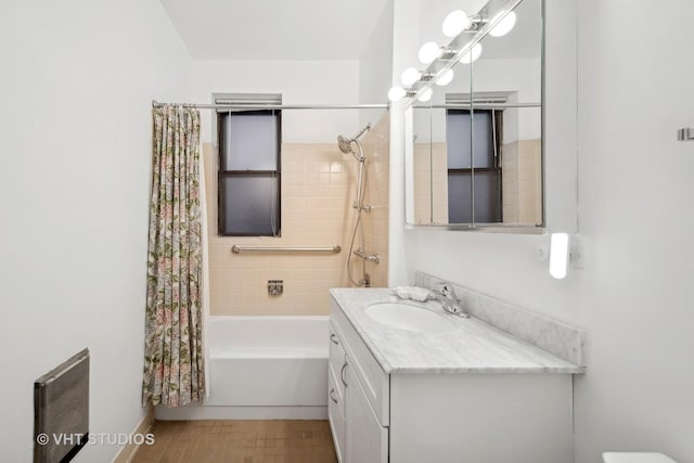 full bath featuring shower / bath combo and vanity