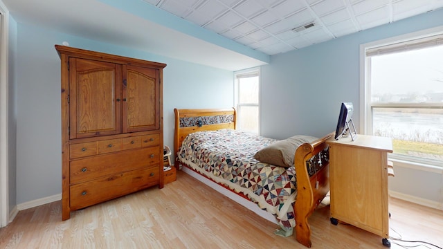 bedroom featuring light hardwood / wood-style floors