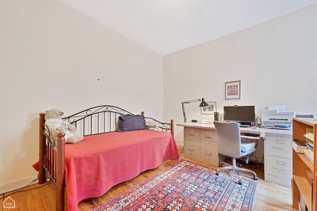 bedroom featuring light wood-type flooring