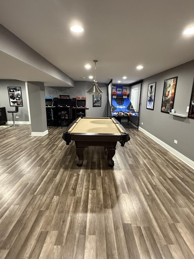 recreation room featuring hardwood / wood-style flooring, billiards, and bar area