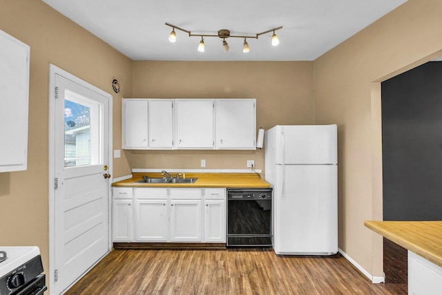 kitchen with sink, white cabinetry, dishwasher, white fridge, and stove