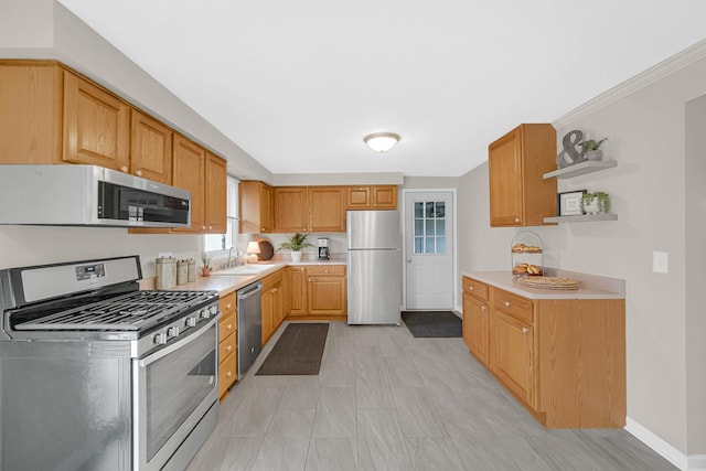 kitchen featuring stainless steel appliances and sink