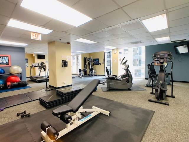 workout area featuring a drop ceiling