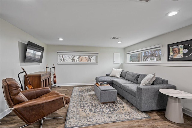 living room featuring dark hardwood / wood-style floors