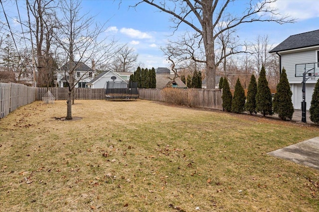 view of yard with a trampoline