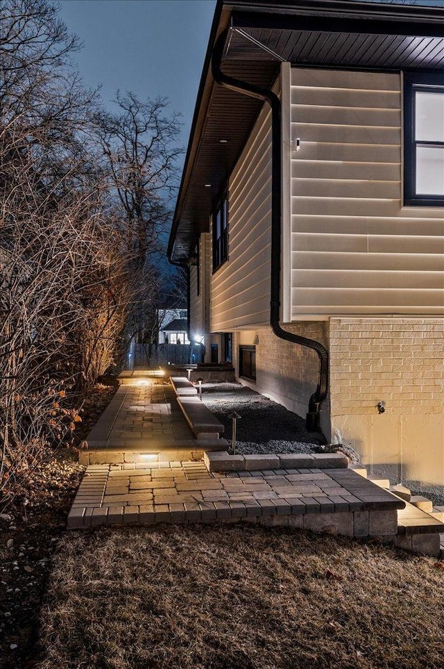 view of home's exterior featuring a patio area