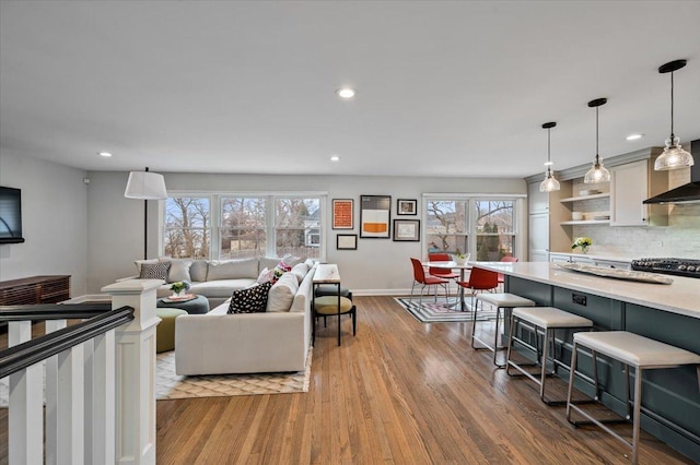 living room with light hardwood / wood-style floors