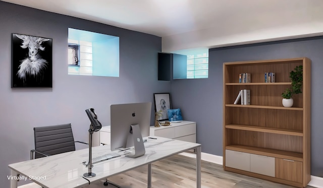 home office featuring light hardwood / wood-style flooring