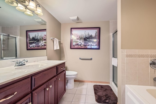 full bathroom with vanity, tile patterned floors, independent shower and bath, and toilet