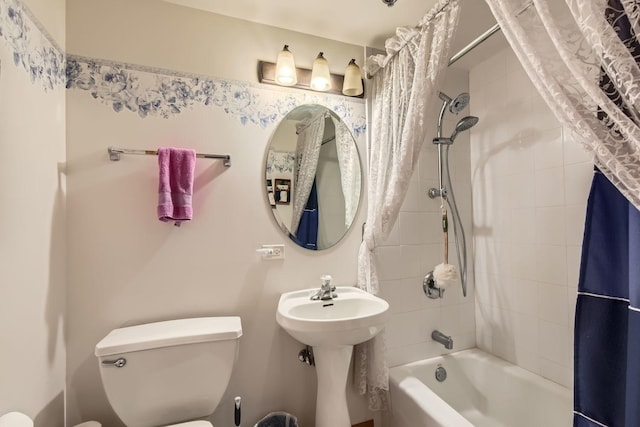 full bathroom with sink, toilet, and shower / bath combo