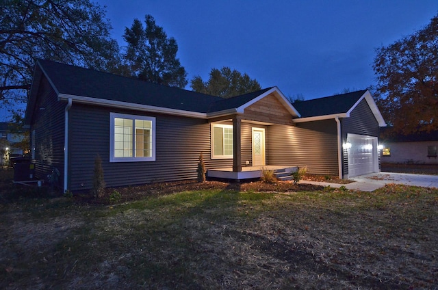 single story home with a garage