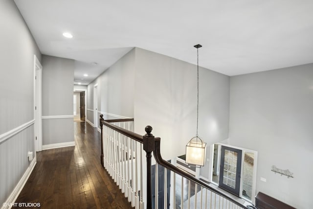 hall featuring dark wood-type flooring