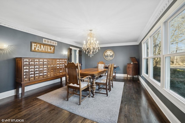 dining space with ornamental molding, dark hardwood / wood-style floors, and a mail area