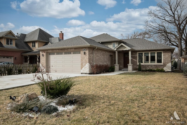 view of front facade with a garage and a front lawn