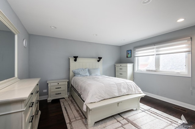 bedroom featuring hardwood / wood-style floors