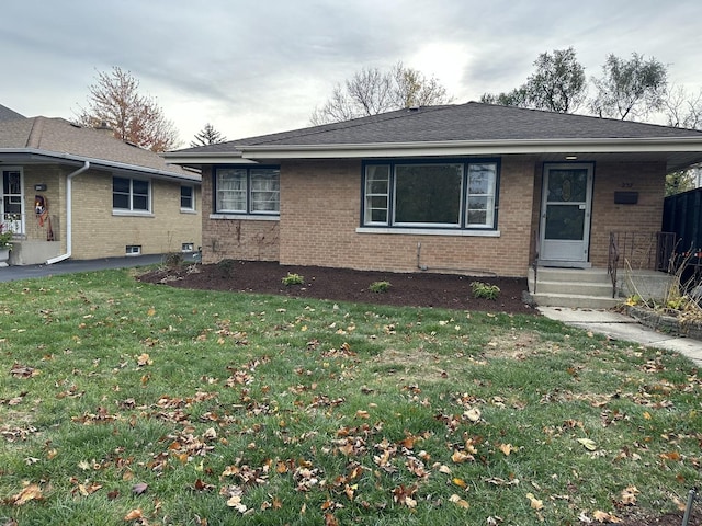 ranch-style home with a front yard