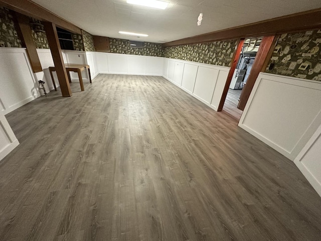 basement with dark wood-type flooring