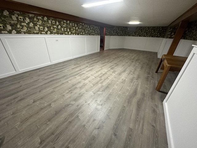 basement with wood-type flooring