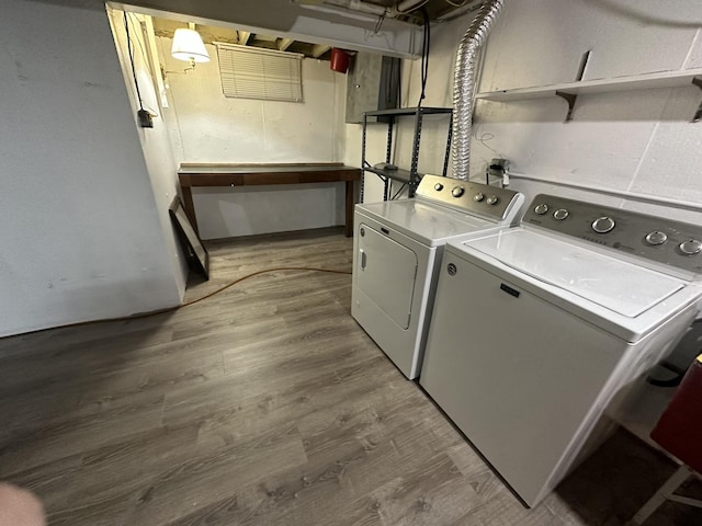 washroom featuring washer and dryer and hardwood / wood-style floors