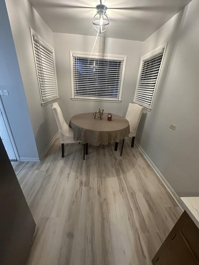 dining space featuring light hardwood / wood-style floors