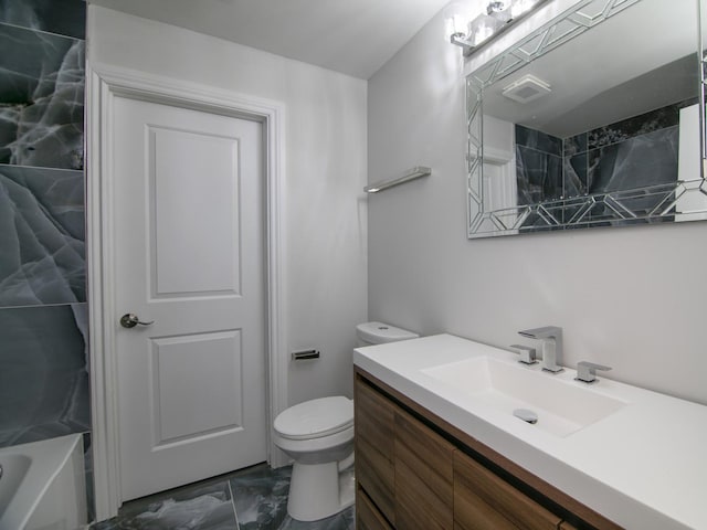 full bathroom featuring vanity,  shower combination, and toilet