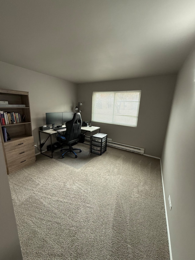 carpeted office featuring a baseboard heating unit