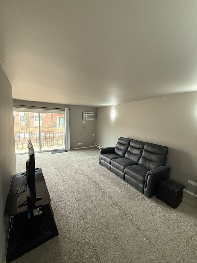 carpeted living room featuring a wall unit AC