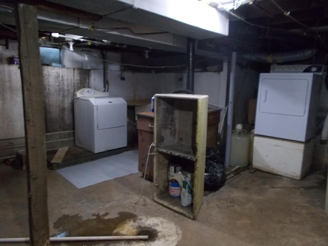 basement with separate washer and dryer